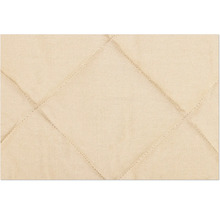 Gros plan d''un tissu matelassé avec motif losanges