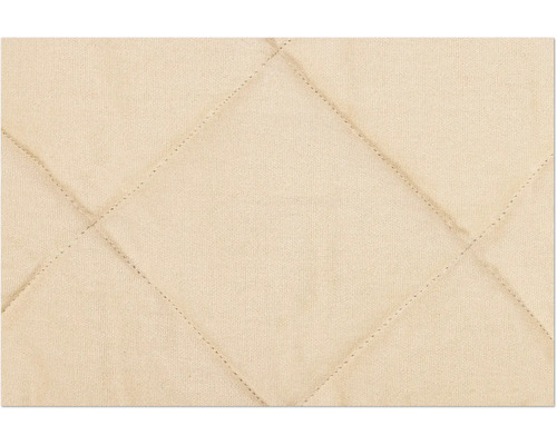 Nahaufnahme eines gesteppten Stoffes mit Rautenmuster