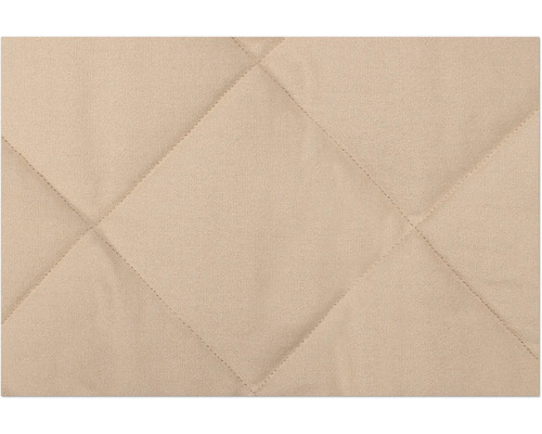 Nahaufnahme von gestepptem Stoff mit Rautenmuster