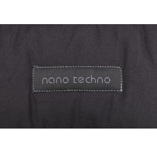 Gros plan d''un morceau de textile portant l''inscription ''nano techno''