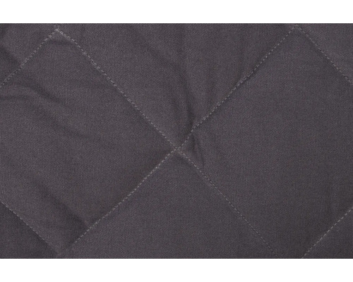 Nahaufnahme eines gesteppten Stoffes mit Rautenmuster