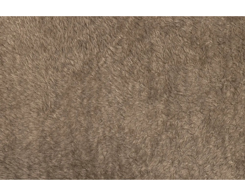 Nahaufnahme eines beigen Kunstfells.