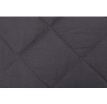 Gros plan d''un tissu matelassé à motif losanges