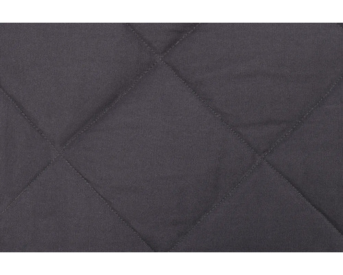 Nahaufnahme von gestepptem Stoff mit Rautenmuster