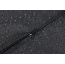 Vue détaillée d''une fermeture éclair sur une housse textile noire avec picots antidérapants