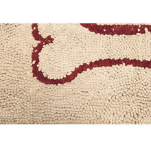 Vue détaillée d''un tapis touffeté avec motif