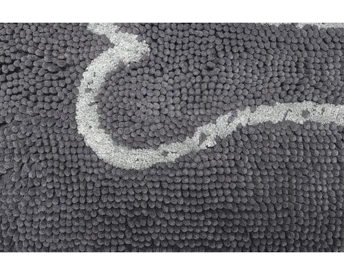 Detailaufnahme eines Badteppichs mit Muster