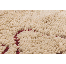 Vue détaillée d''un tapis berbère beige avec motif