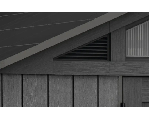 Detailansicht eines Gartenhauses mit Lüftungsgitter