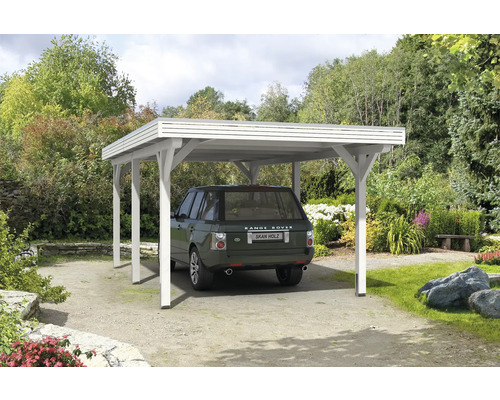 Carport individuel SKAN HOLZ Spessart avec ancre de poteau 355 x 604 cm blanc Voiture sous un abri de voiture en bois dans le jardin.
