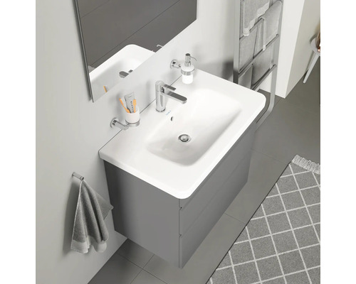 Lavabo de salle de bain avec meuble sous-lavabo, miroir, robinetterie et accessoires de salle de bain