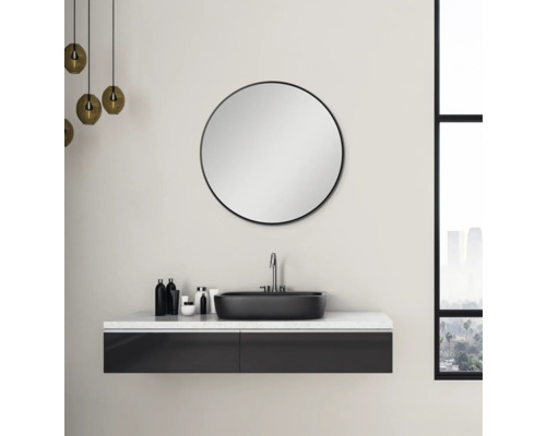 Modernes Badezimmer mit rundem Spiegel, Waschbecken und Unterschrank