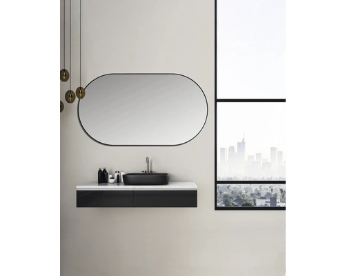 Salle de bains moderne avec meuble-lavabo noir, miroir ovale et vue sur la ville