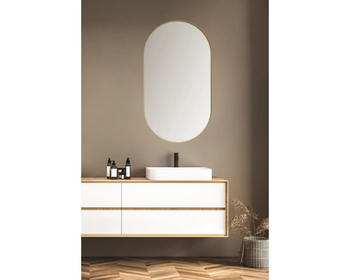 Salle de bains moderne avec meuble sous-lavabo, vasque à poser et miroir ovale