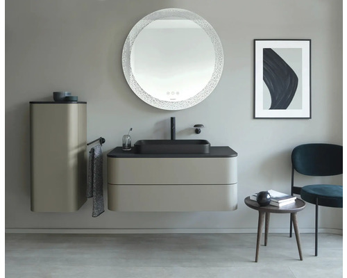 Salle de bains avec lavabo, armoire de toilette et miroir rond