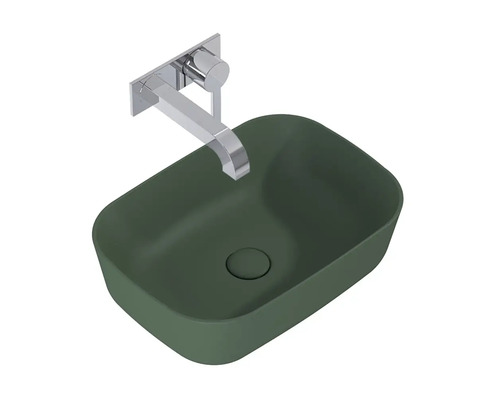 Vasque à poser verte avec robinetterie murale en métal
