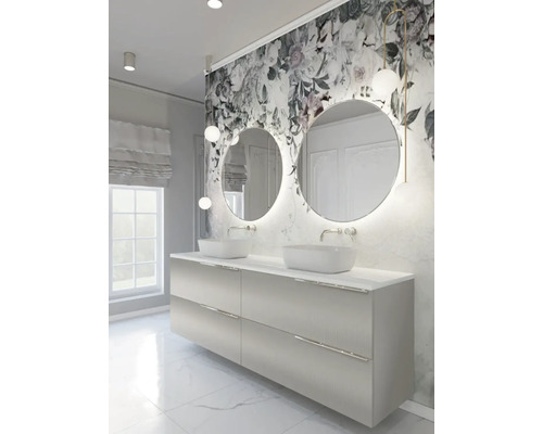 Salle de bain lumineuse avec double vasque, meuble sous-vasque, miroirs ronds et papier peint floral