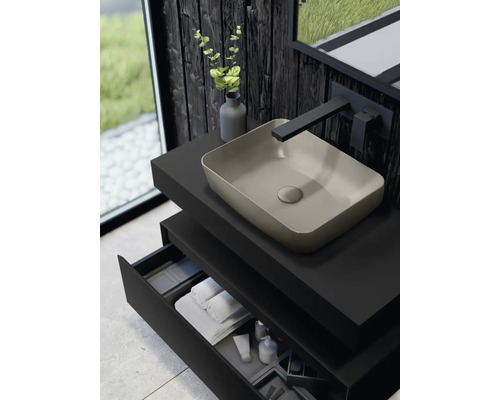 Salle de bain moderne avec vasque à poser, meuble sous-vasque et robinetterie