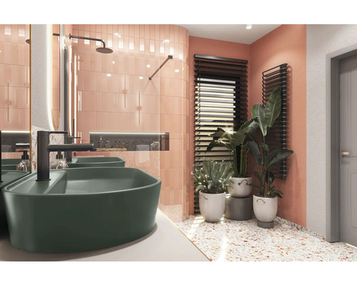 Salle de bains lumineuse avec double vasque, robinetterie, radiateur et plantes