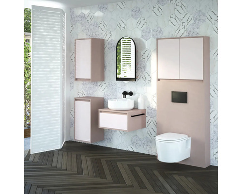 Salle de bain moderne avec lavabo, armoire de toilette, toilettes et carreaux muraux hexagonaux.