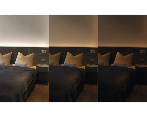 Chambre à coucher avec lit, tables de chevet et éclairage