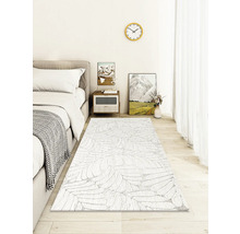 Chambre avec lit, table de chevet et tapis à motifs