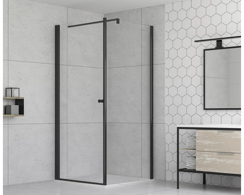 Paroi de douche avec cadre noir dans une salle de bains