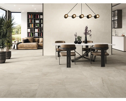 Séjour lumineux avec table à manger, chaises et carrelage.