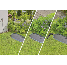 Gardena Pipeline Wassersteckdose im Garten mit Blumen und Rasen