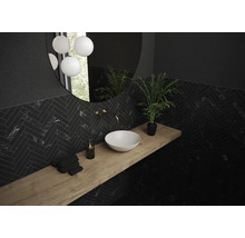 Salle de bains avec motif à chevrons noir, meuble-lavabo en bois, lavabo à poser et miroir rond