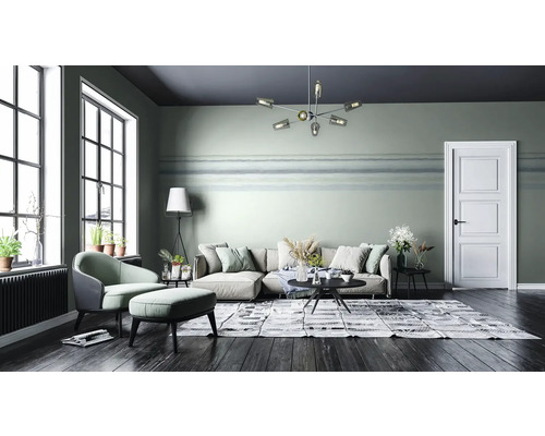 Salon avec canapé, fauteuil, tapis et plantes d''intérieur dans un design moderne.