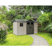 Abri de jardin avec double porte sur pelouse
