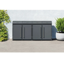 Quatre abris poubelles en métal devant un mur avec des plantes