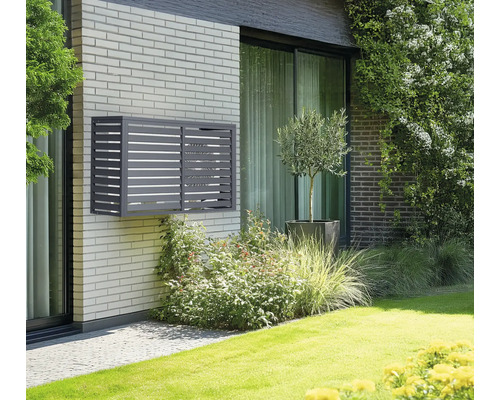 Habillage de pompe à chaleur WESTMANN Boxa Taille M 140 x 50 x 92 cm anthracite Cache climatiseur gris sur un mur de maison en briques