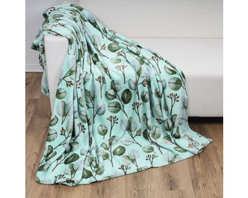 Couverture à motif d''eucalyptus sur un canapé