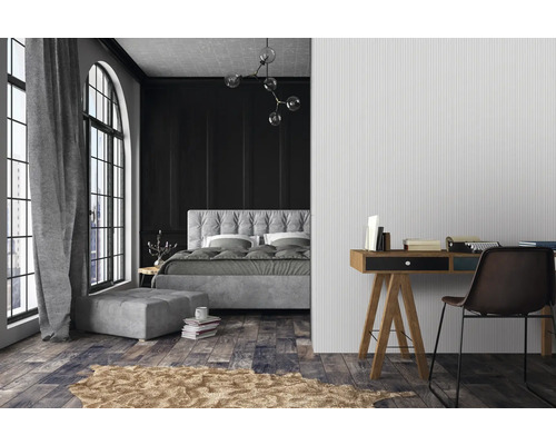 Chambre à coucher avec lit, bureau et chaise dans des tons foncés