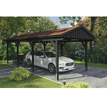 Carport mit Auto auf gepflastertem Untergrund