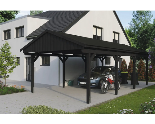 Carport en bois noir avec voiture et moto devant une maison