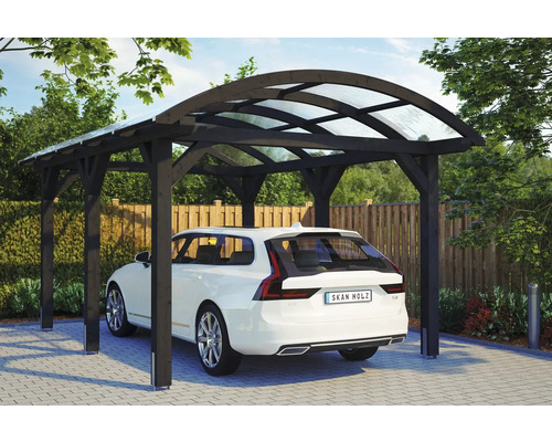 Abri de voiture avec véhicule dans le jardin