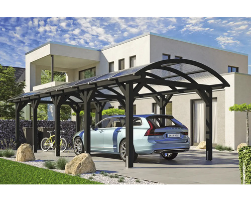 Holzcarport mit Auto und Fahrrad vor einem Haus