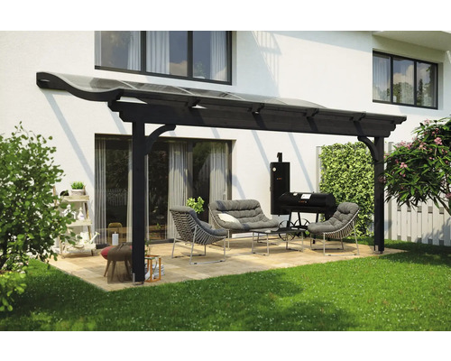 Terrasse mit Überdachung, Sitzgruppe und Grill