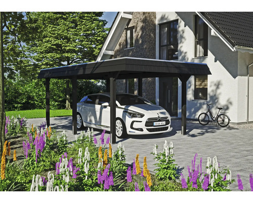 Carport mit Auto und Fahrrad vor einem Haus