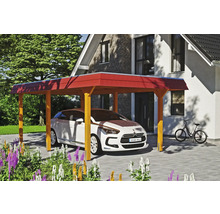 Abri de voiture en bois avec une voiture et un vélo devant une maison