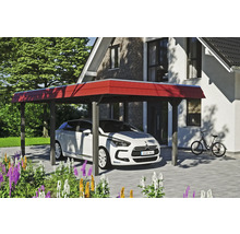 Abri de voiture avec voiture devant une maison