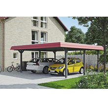 Double carport avec deux voitures devant une maison