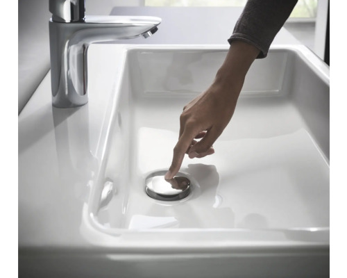 Photo d''un lavabo avec panneau de commande pour la bonde