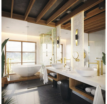 Salle de bains lumineuse avec baignoire îlot, meuble-lavabo et douche