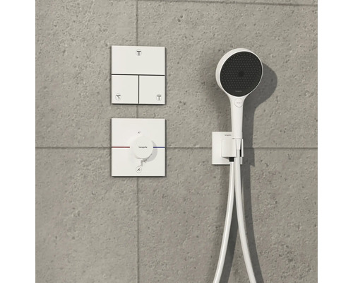 Système de douche avec douche de tête, douchette à main et robinet thermostatique pour le contrôle de la température