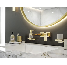 Modernes Badezimmer mit Marmorwaschtisch und goldenem Spiegel