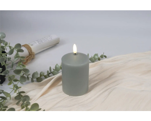 Bougie LED décorative sur un support en tissu